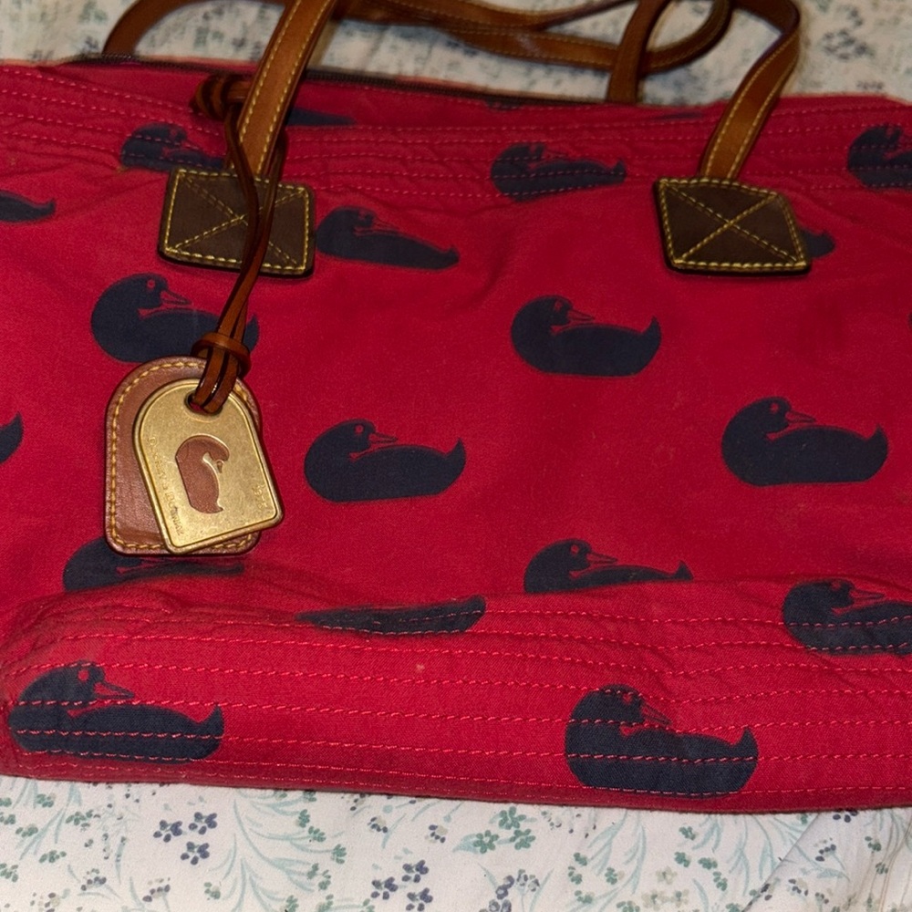 Dooney and Bourke red with blue duck canvas